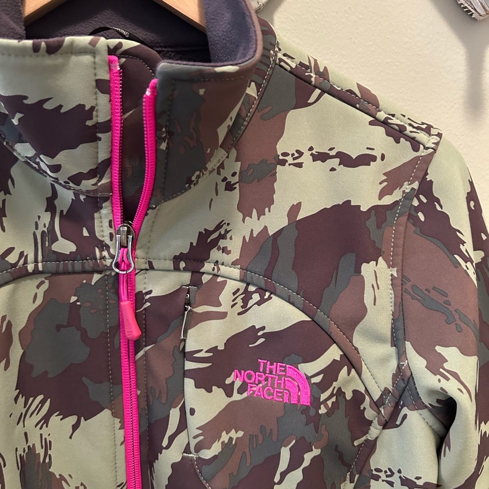 The North Face women’s camo zip up jacket.